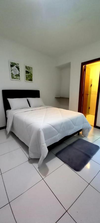 Bliss Hoteis Centro Búzios Exterior foto A bedroom with a bed and a bathroom