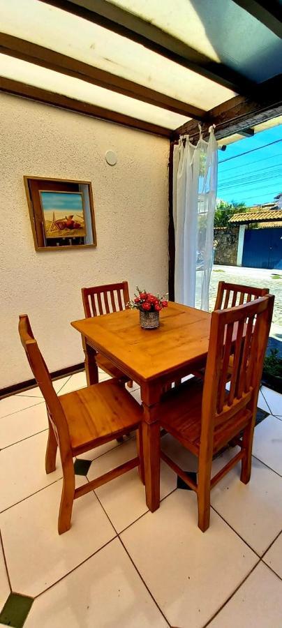 Bliss Hoteis Centro Búzios Exterior foto A dining room table with four chairs