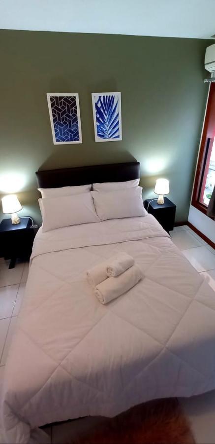 Bliss Hoteis Centro Búzios Exterior foto A bed with a duvet